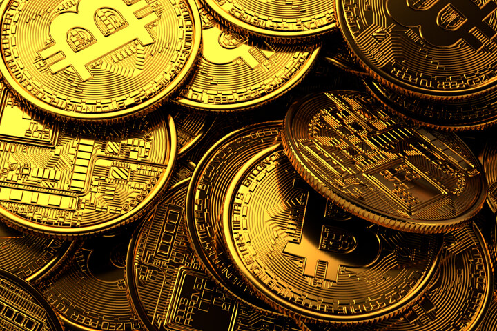 Scattered bitcoins dropped on table free image download
